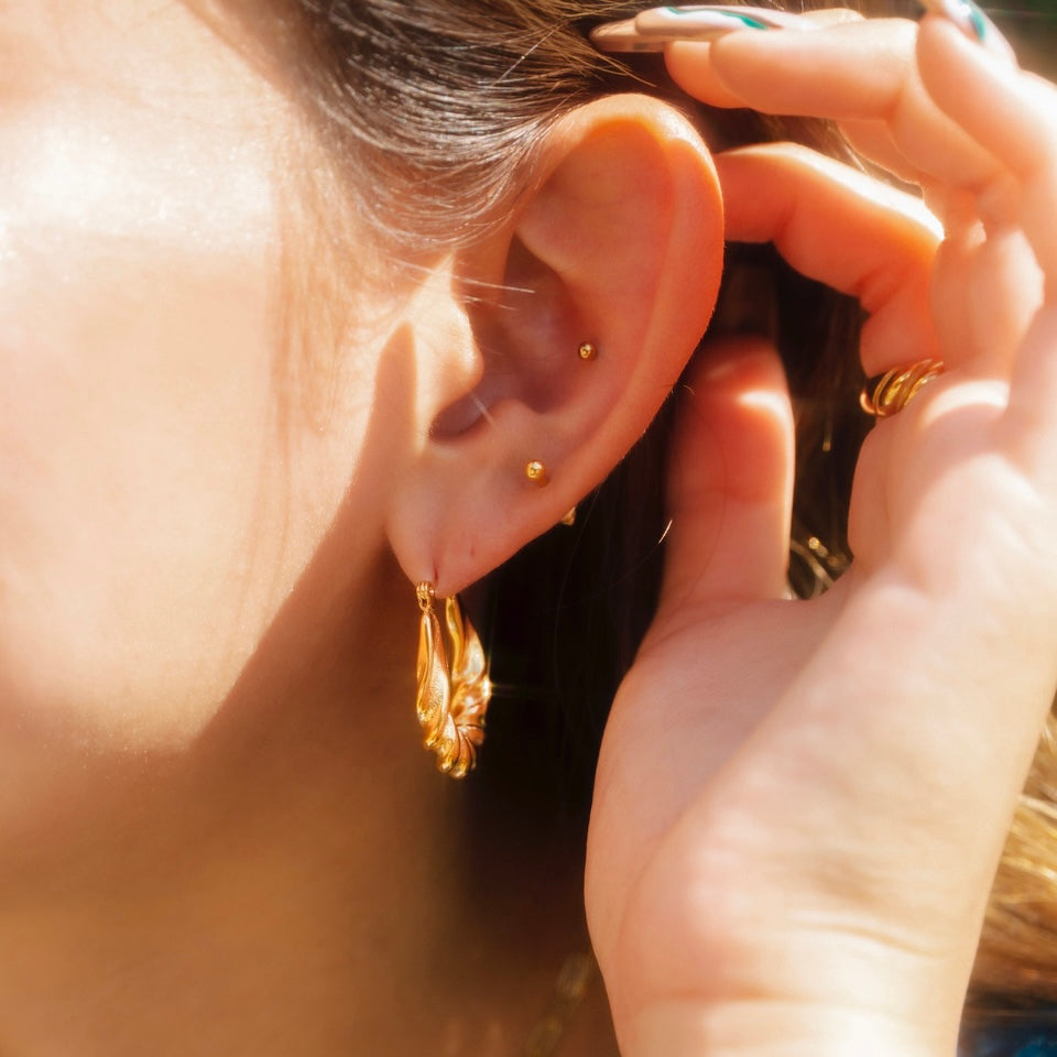 TWISTED HOOP EARRINGS